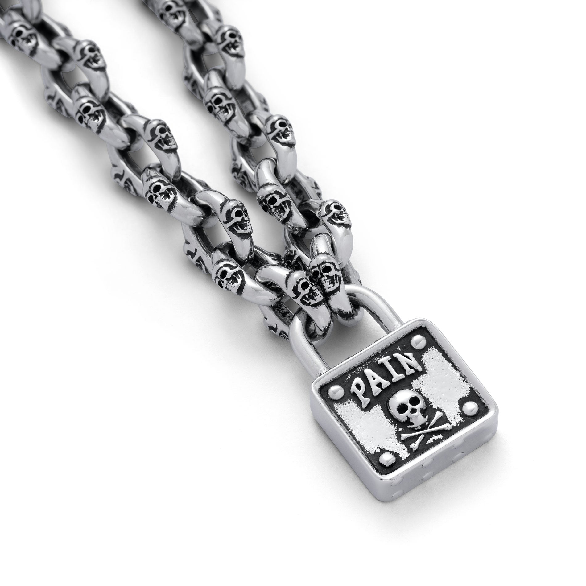 Silver skull chain with padlock pendant with skull and word "pain" embedded above skull.