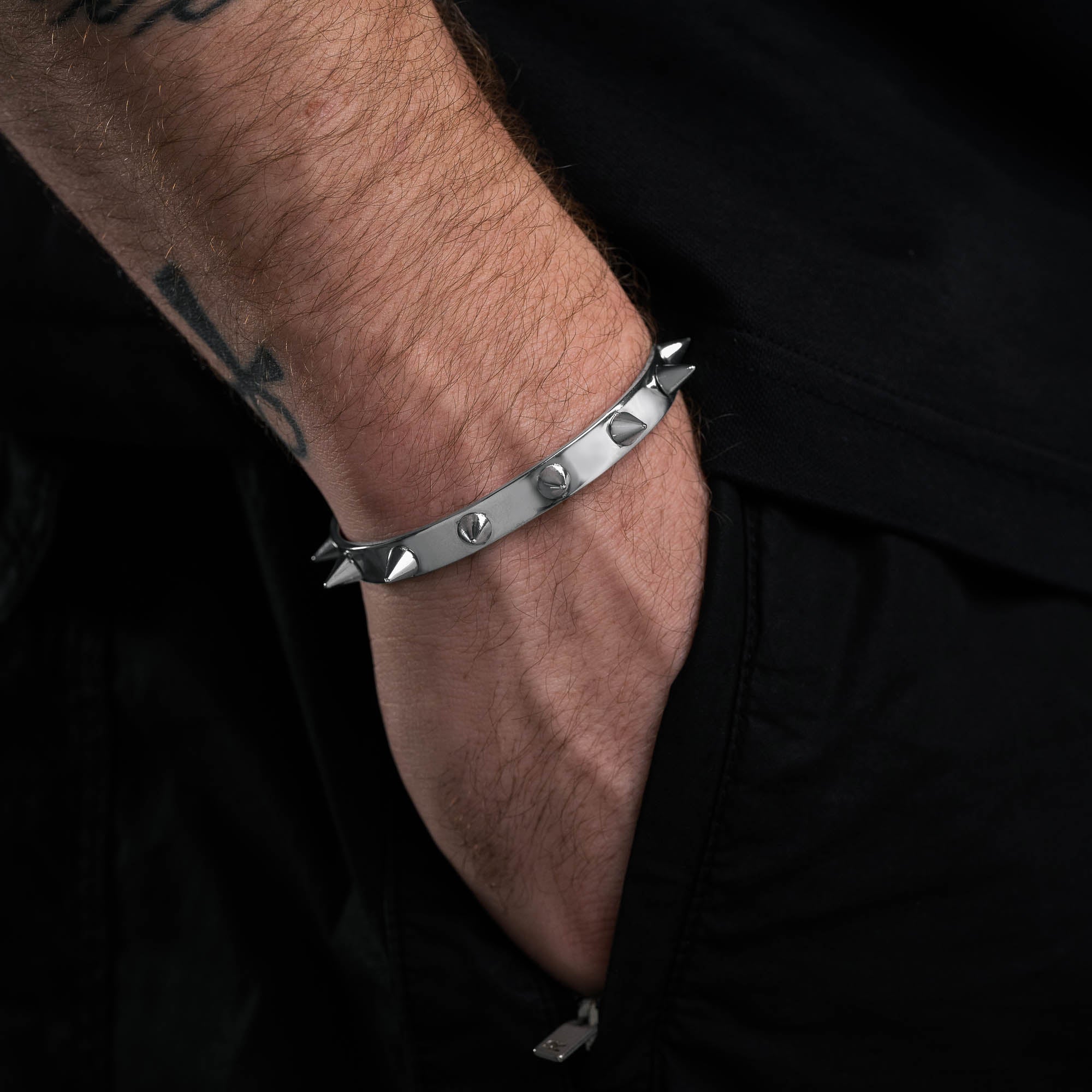 Silver Spiked Cuff bracelet with collar details on male model